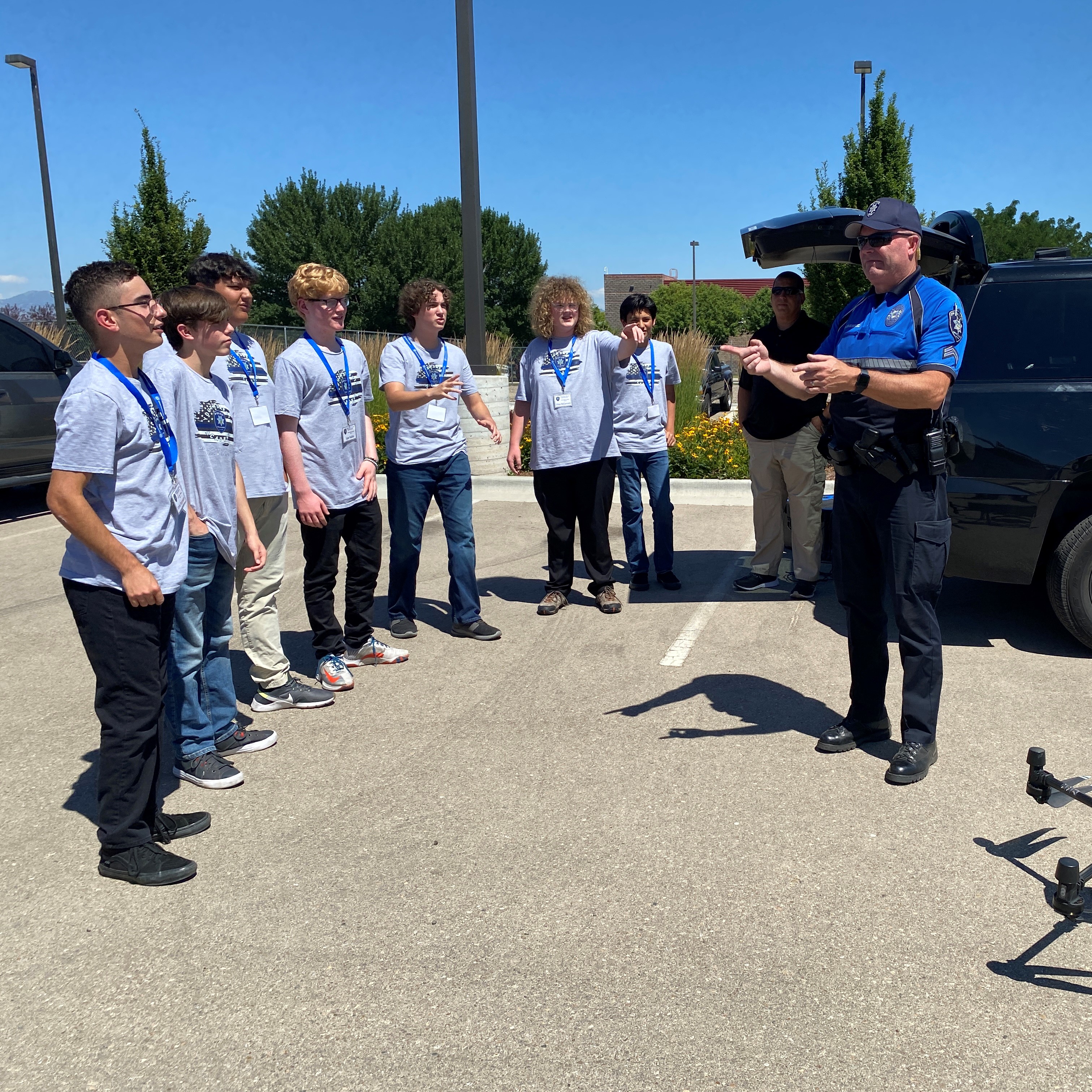 Police Officer demonstrating a drone to the Youth Safety Academy.